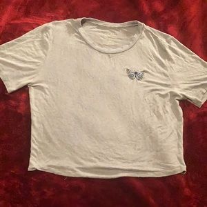 baby blue croptop with little butterfly, originally $11.99 but selling for 6.99.